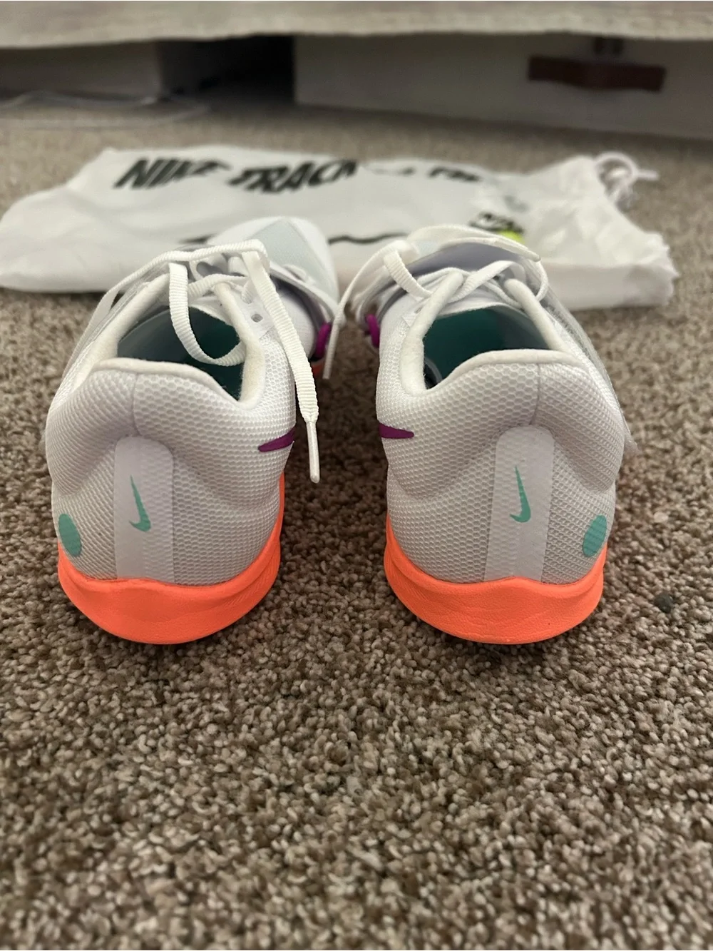 Nike White Track & Field Spikes with Pink Accent - long jump
